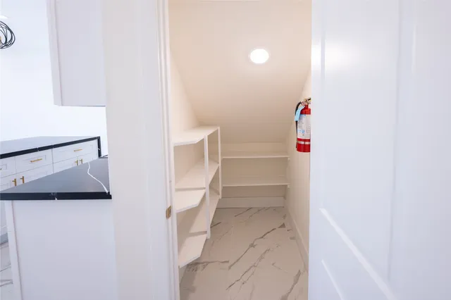 a bathroom with a sink and a shower curtain