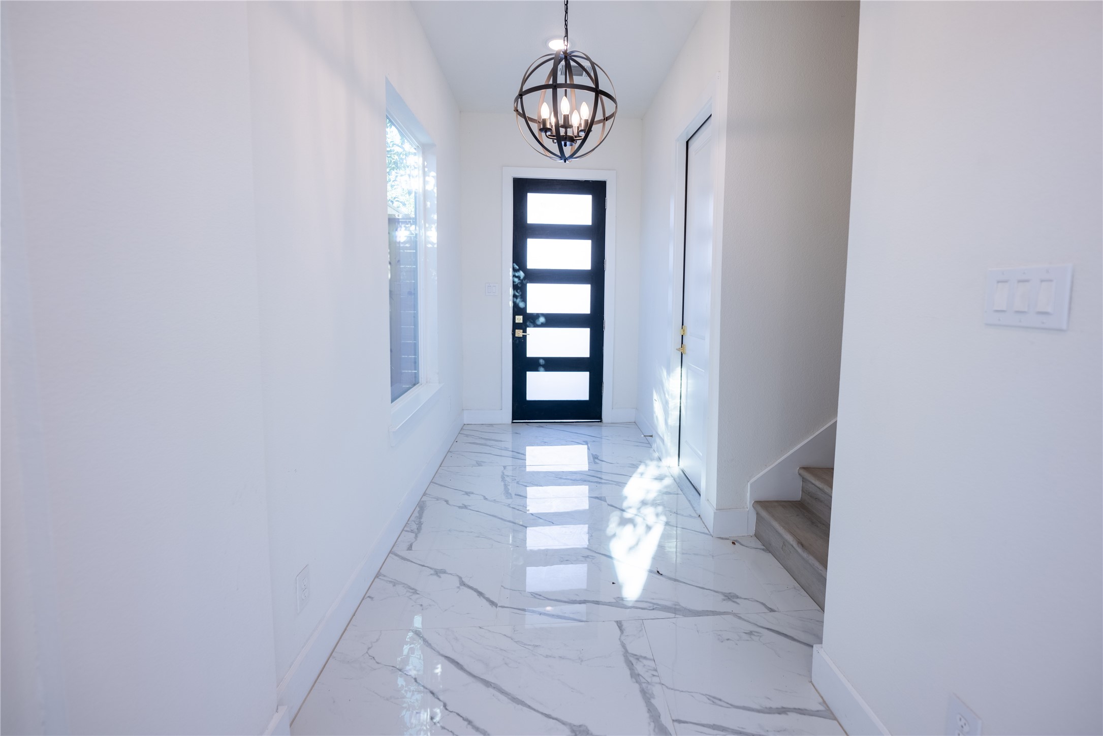 5906 St Augustine Street, Unit B Houston, TX 77021 - Photo 13 of 27 a view of an entryway with wooden floor