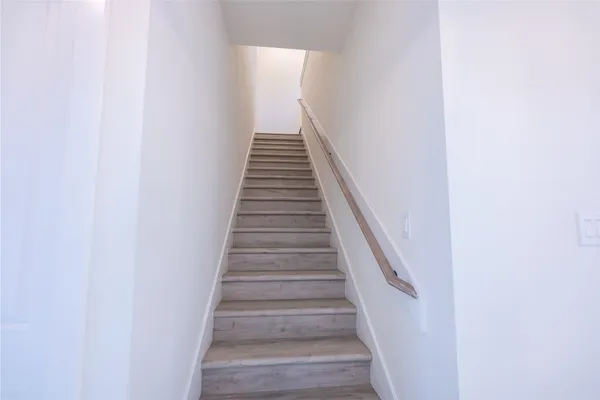 a view of a livingroom from a hallway