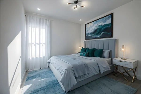 a view of a workspace with furniture and a potted plant