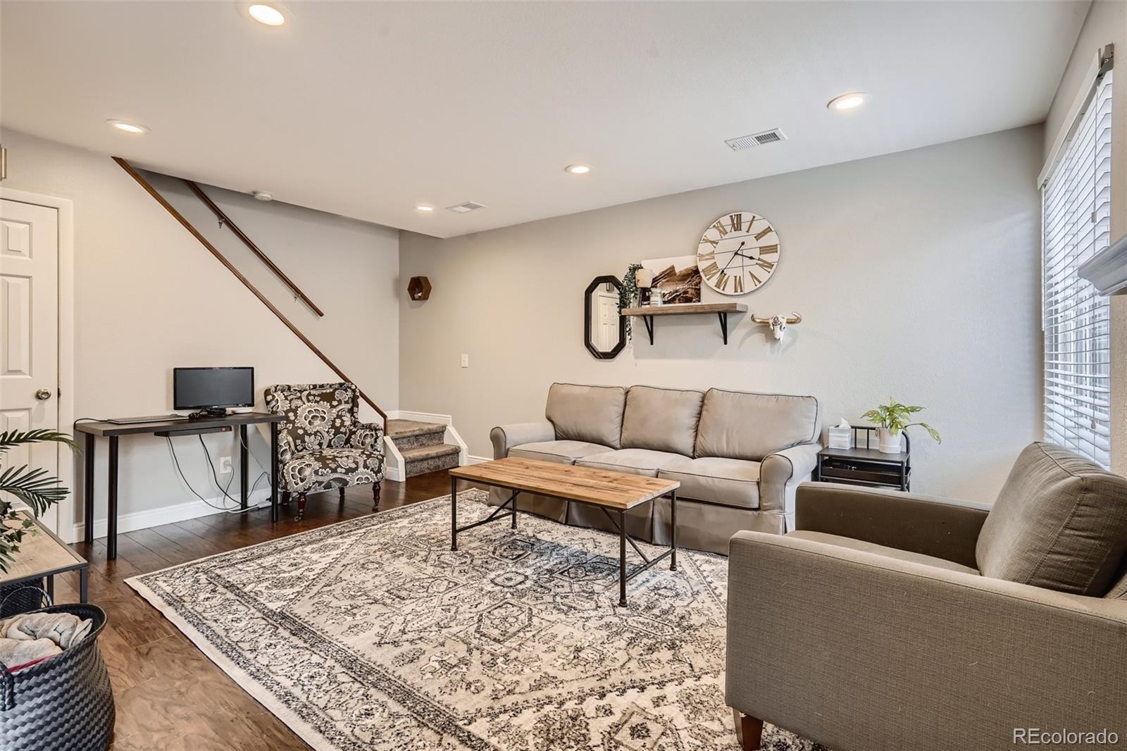 7972 Chase Circle, Unit 82 Arvada, CO 80003 - Photo 3 of 11 a living room with furniture
