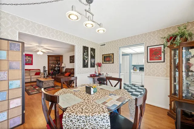 a view of a dining room with furniture