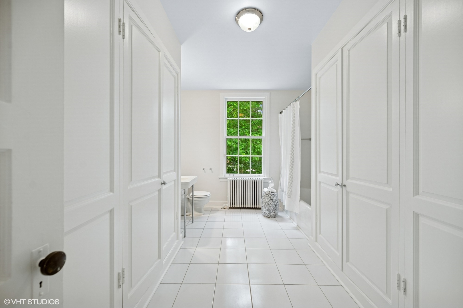 550 Oak Street Winnetka, IL 60093 - Photo 32 of 45 a bathroom with a sink toilet and shower