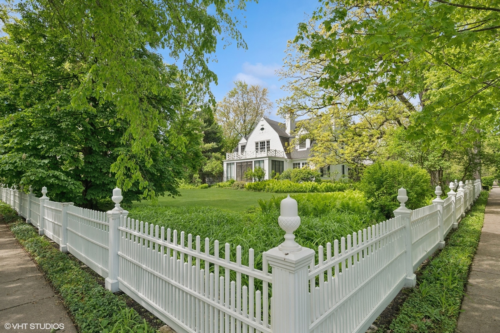 550 Oak Street Winnetka, IL 60093 - Photo 38 of 45 a view of a house with wooden fence