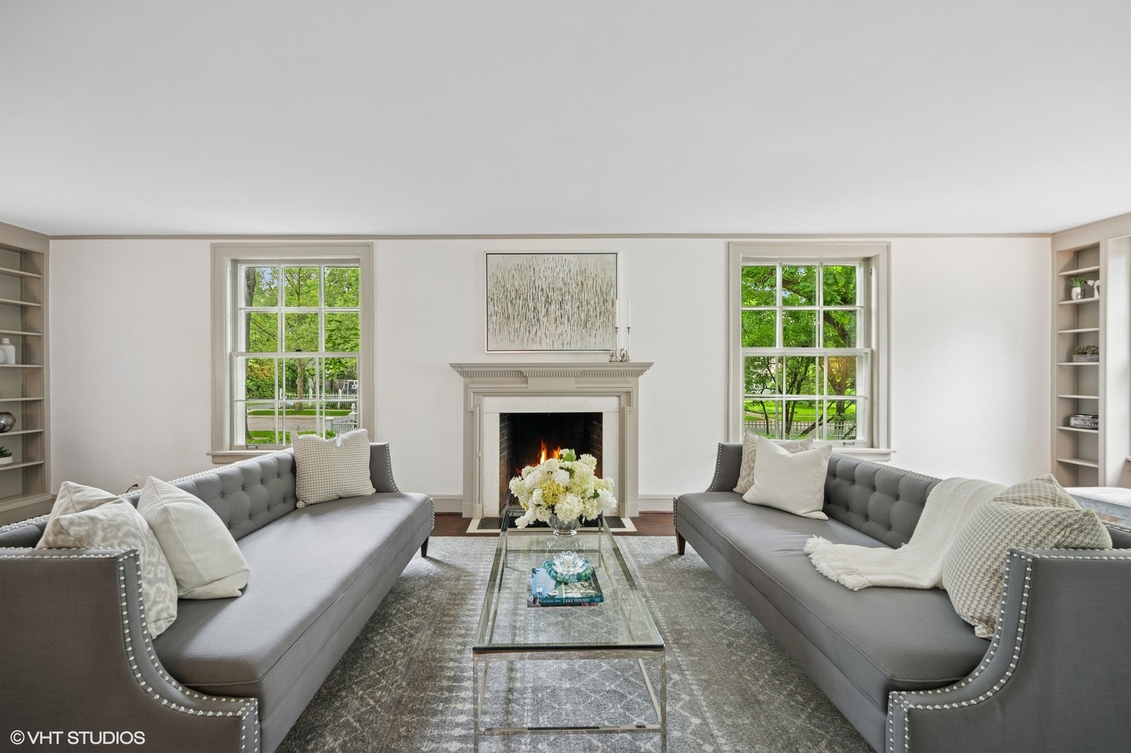 550 Oak Street Winnetka, IL 60093 - Photo 5 of 45 a living room with furniture and a fireplace
