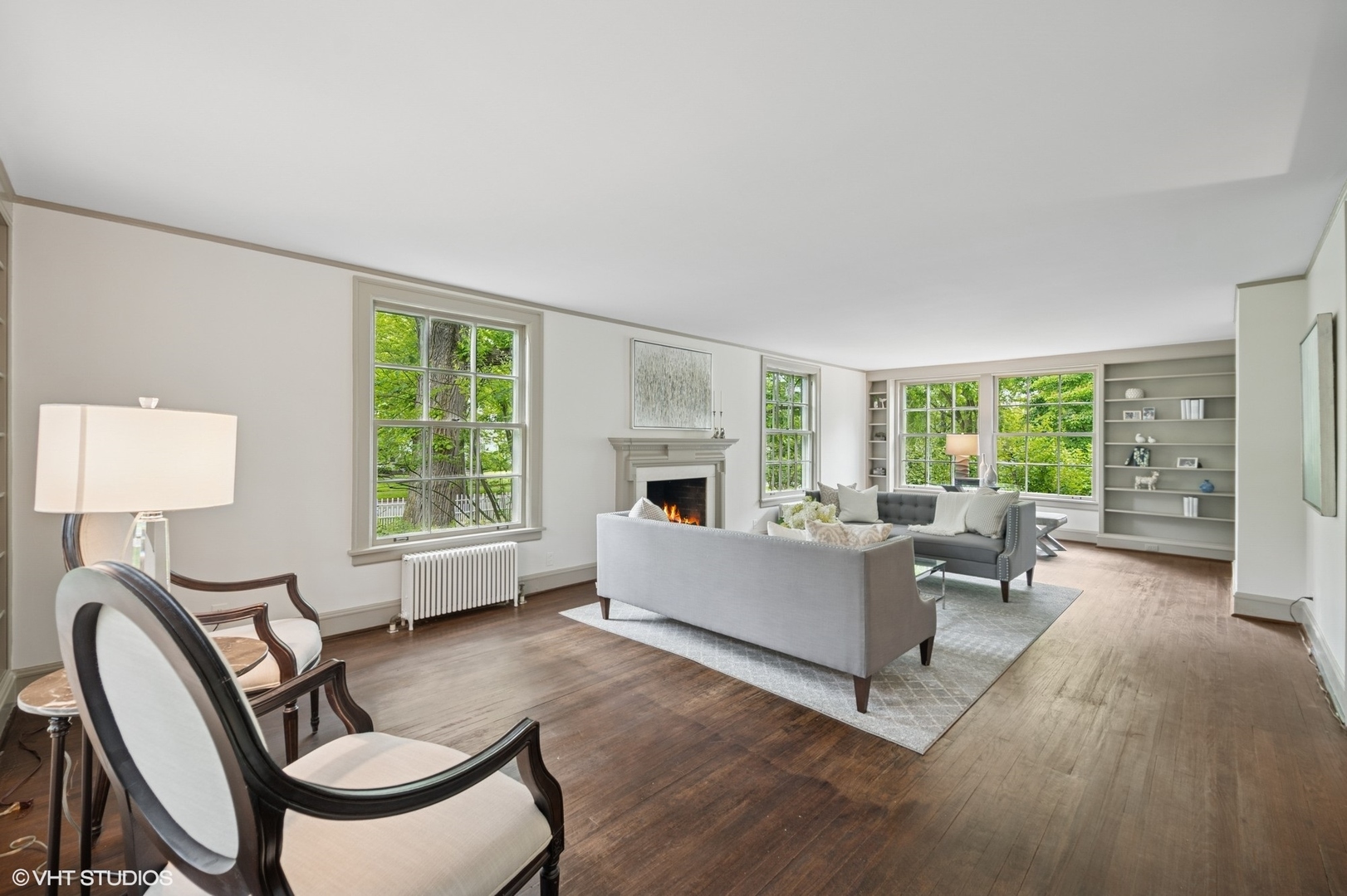 550 Oak Street Winnetka, IL 60093 - Photo 6 of 45 a living room with furniture fireplace and a window