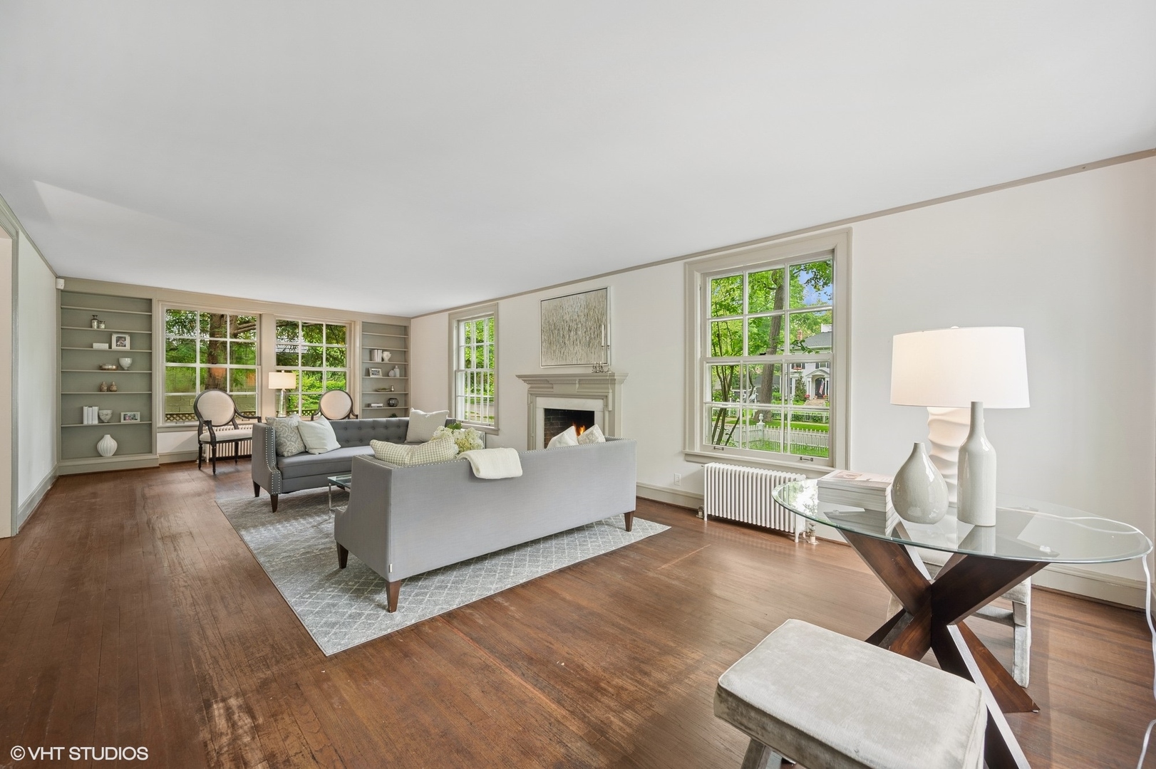 550 Oak Street Winnetka, IL 60093 - Photo 7 of 45 a living room with fireplace furniture and a large window