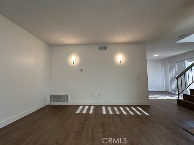 12621 Moordale Circle, Unit H Stanton, CA 90680 - Photo 8 of 17 a view of an empty room