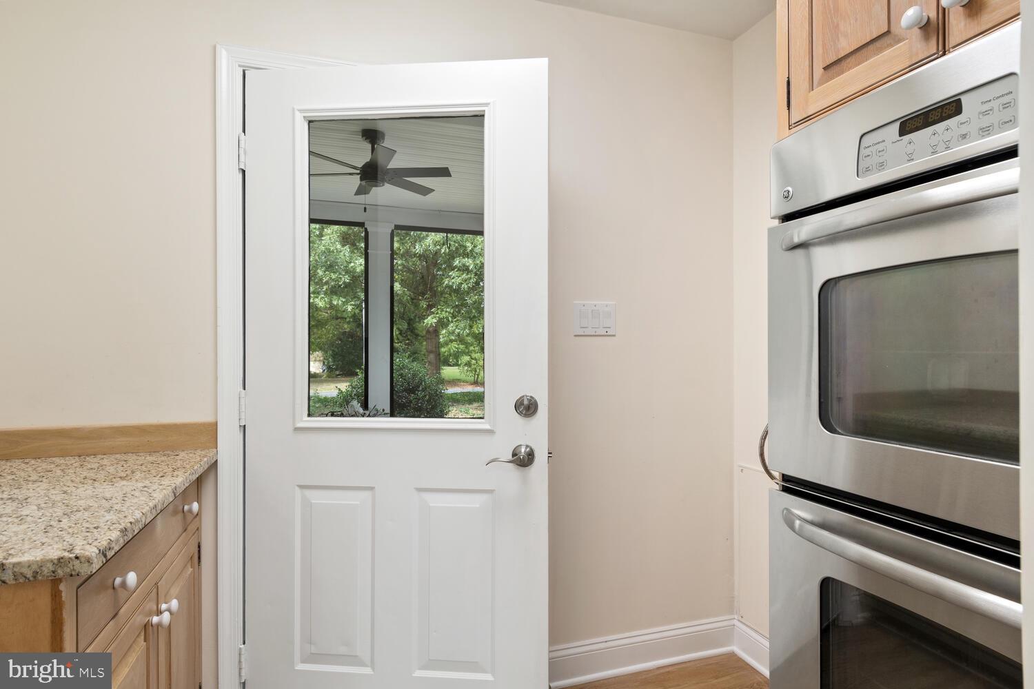 6957 Bellevue Road Royal Oak, MD 21662 - Photo 17 of 47 PANTRY TO SCREENED PORCH