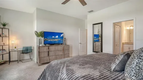 a bedroom with a bed and furniture