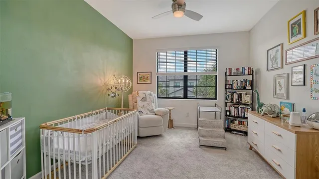 a bathroom with a bathtub and a window