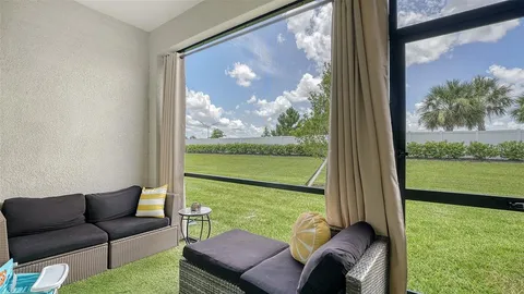 a view of an outdoor space with furniture