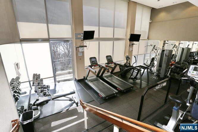 4 Horizon Road, Unit 1027 Fort Lee, NJ 07024 - Photo 32 of 38 a view of a room with gym equipment