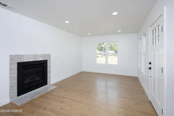 a view of an empty room and window