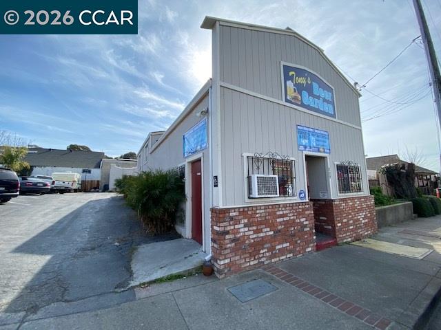 809 West 2nd Street Antioch, CA 94509 - Photo 4 of 23 a view of a street with a parked cars