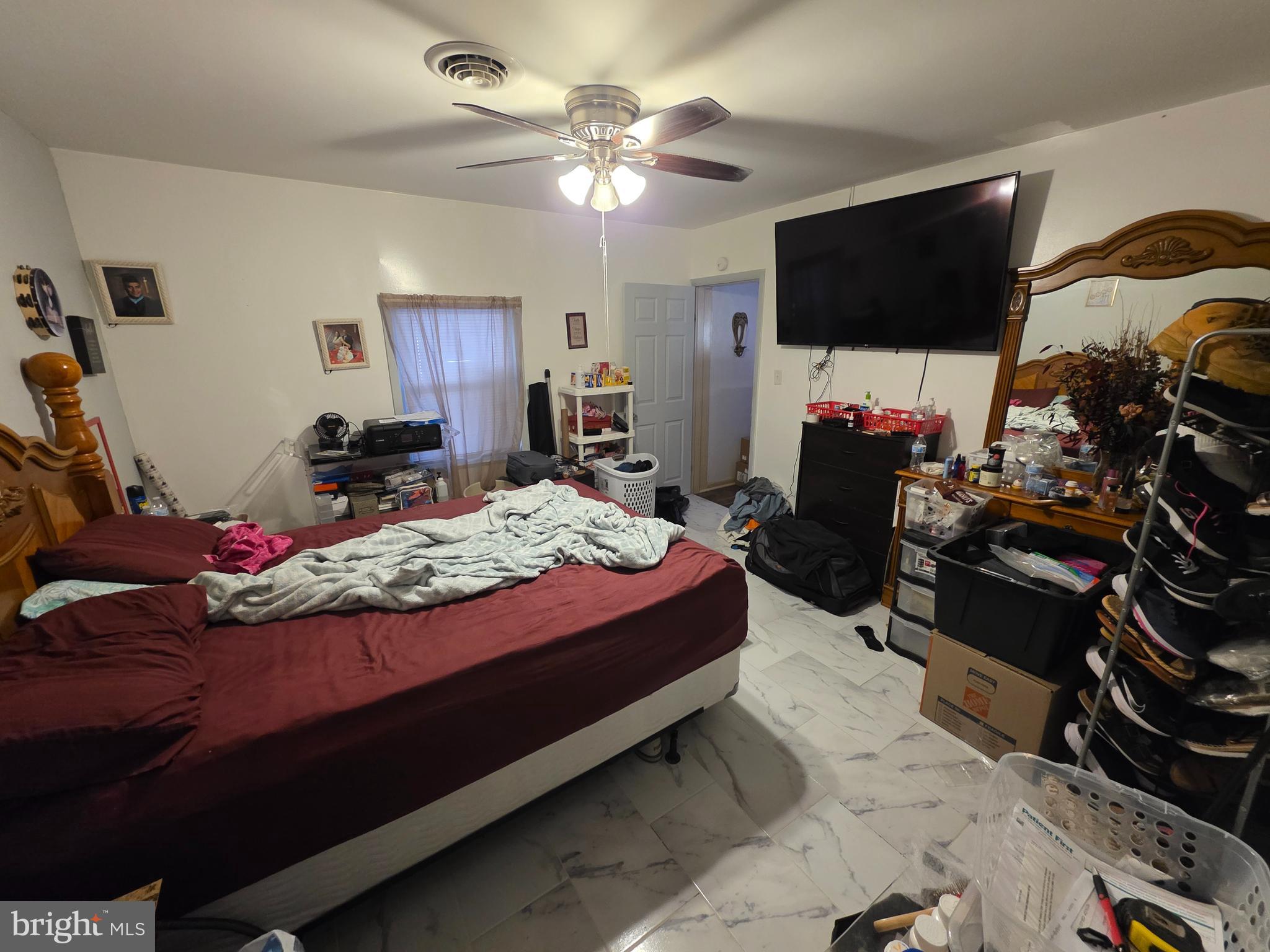 44 Springvale Road Red Lion, PA 17356 - Photo 18 of 29 a bedroom with a bed and a flat tv screen on dresser