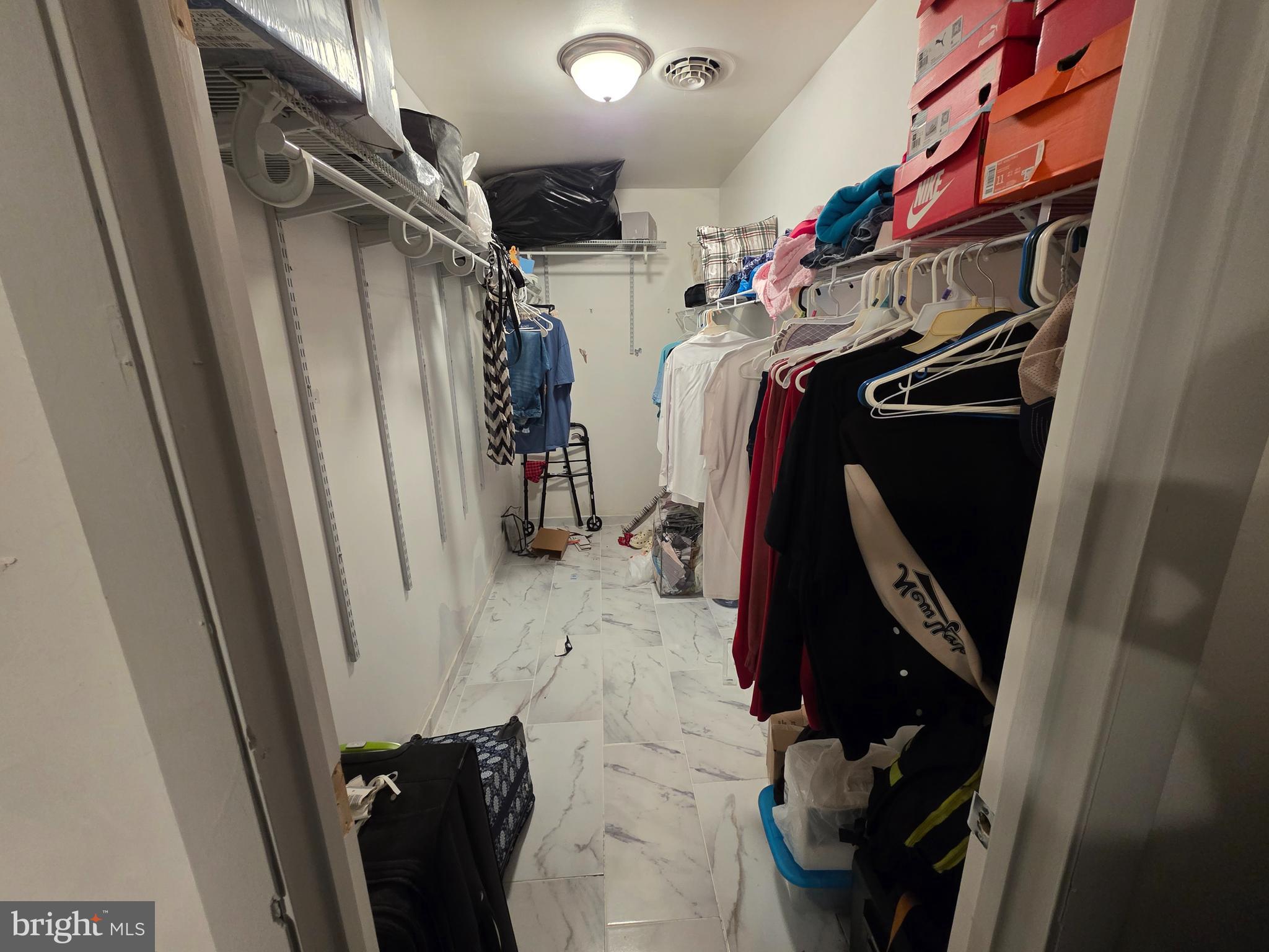 44 Springvale Road Red Lion, PA 17356 - Photo 19 of 29 a view of walk in closet with clothes and shoes