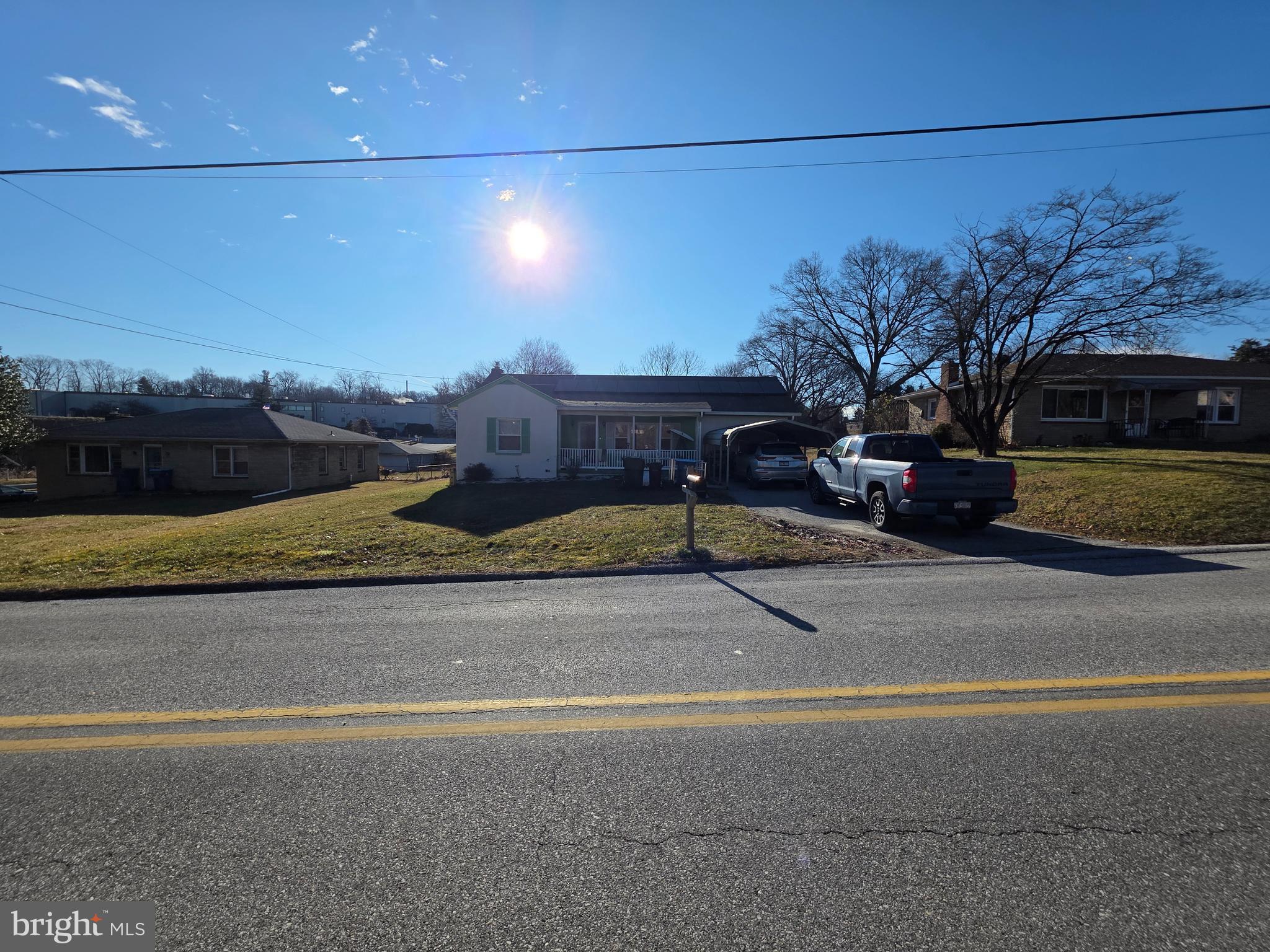 44 Springvale Road Red Lion, PA 17356 - Photo 2 of 29 a view of a city street with a car parked on the road