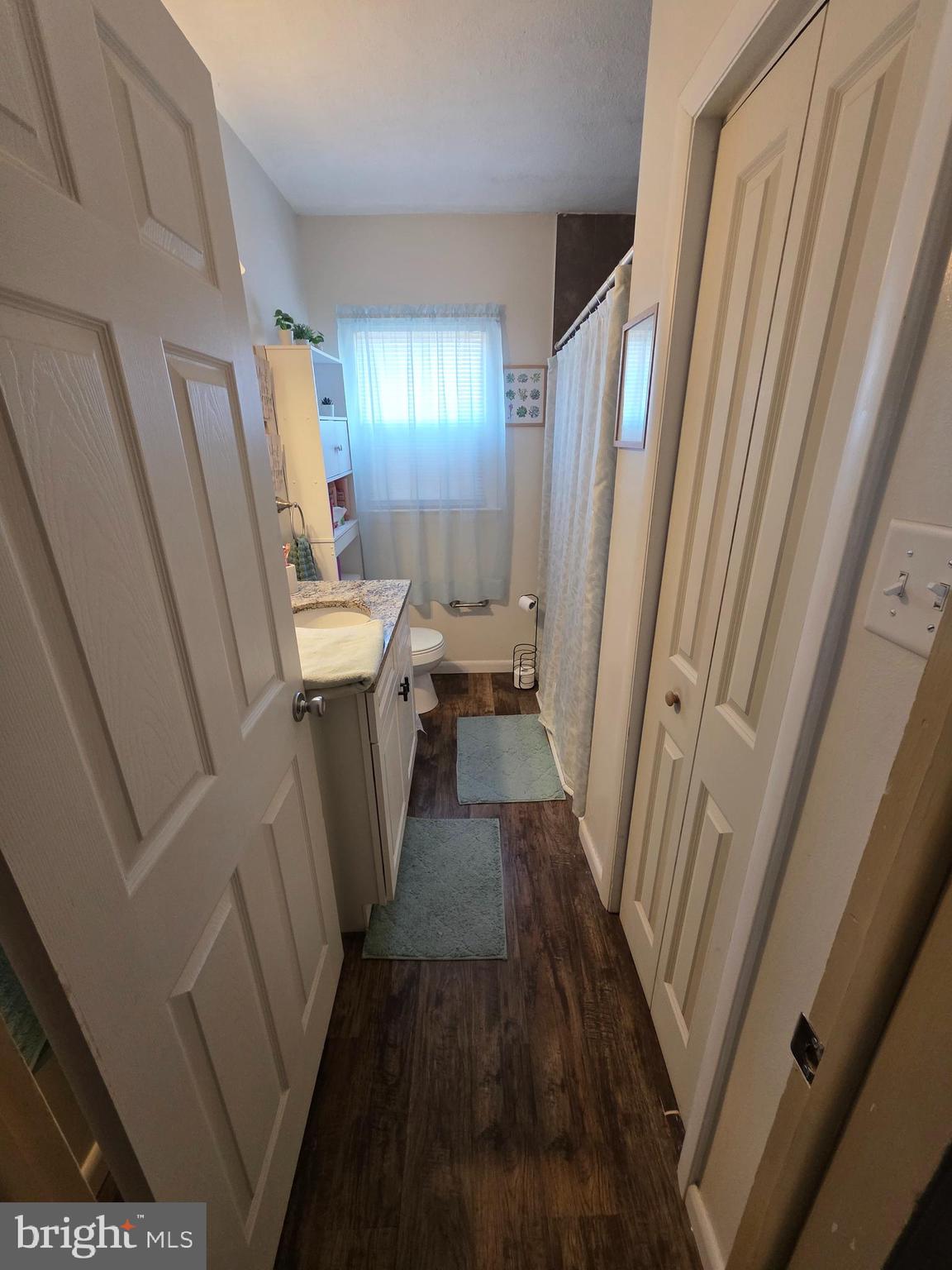44 Springvale Road Red Lion, PA 17356 - Photo 24 of 29 a bathroom with sink a mirror a vanity and a shower