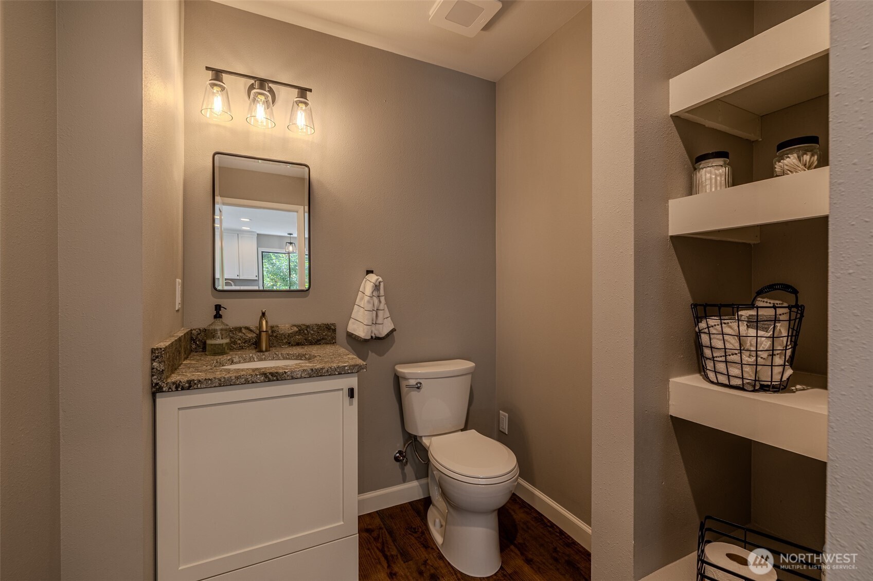 4124 Lakeview Place Chelan, WA 98816 - Photo 15 of 40 a bathroom with a toilet a sink and mirror