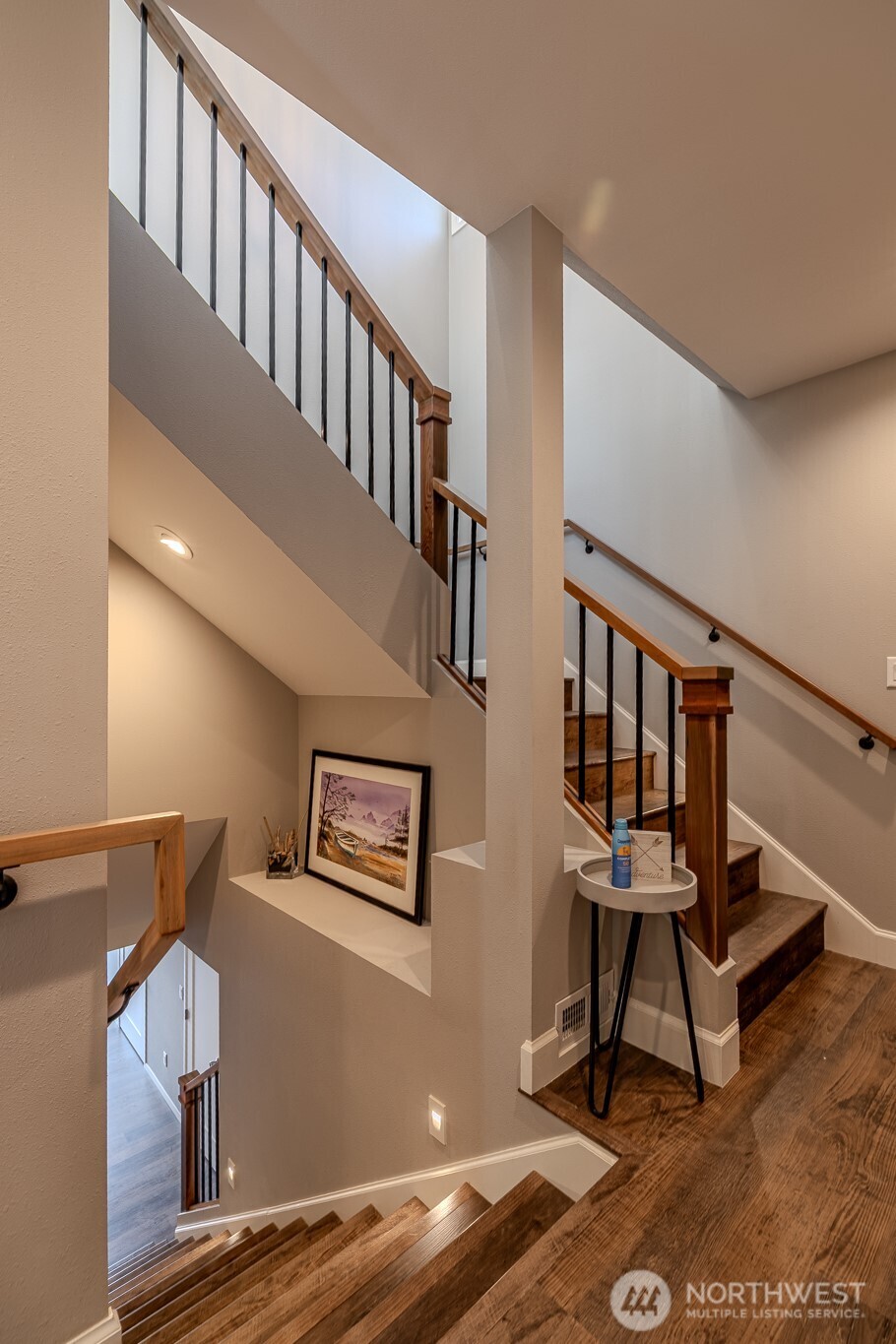 4124 Lakeview Place Chelan, WA 98816 - Photo 16 of 40 a view of staircase with wooden floor and windows