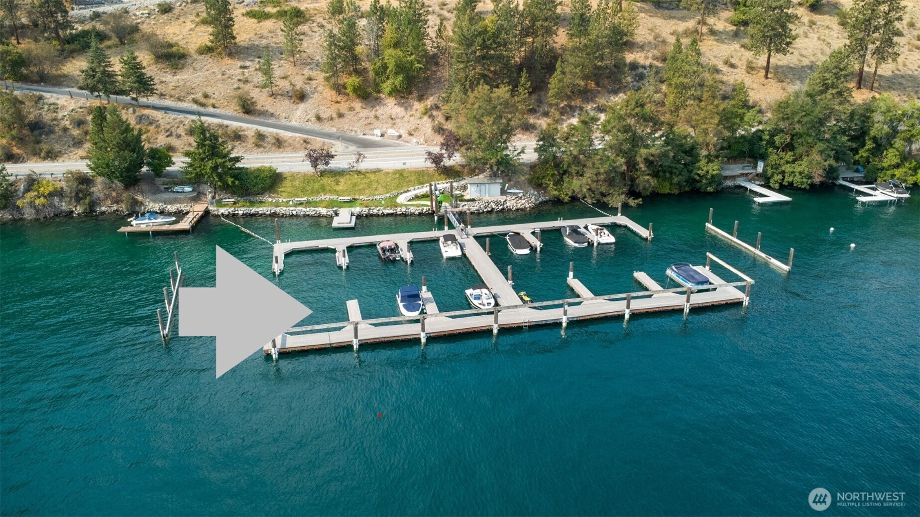 4124 Lakeview Place Chelan, WA 98816 - Photo 3 of 40 an aerial view of a house with a yard table chairs and fire pit