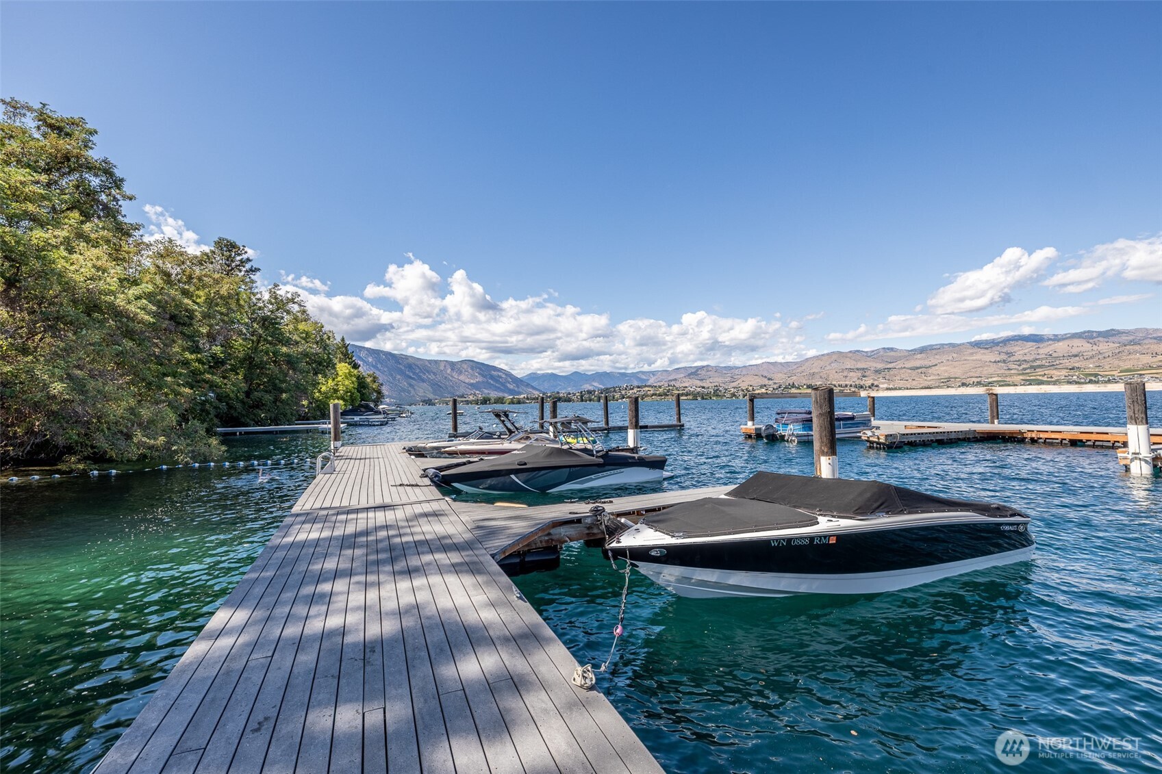 4124 Lakeview Place Chelan, WA 98816 - Photo 33 of 40 a view of a house with backyard and sitting area