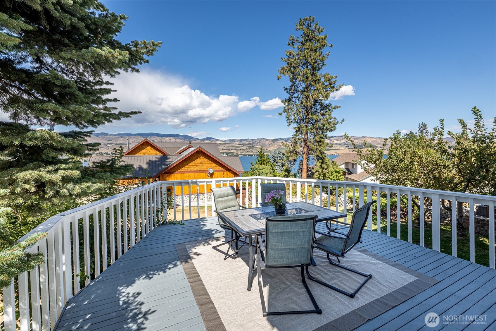 4124 Lakeview Place Chelan, WA 98816 - Photo 36 of 40 a view of a chairs and table on the deck