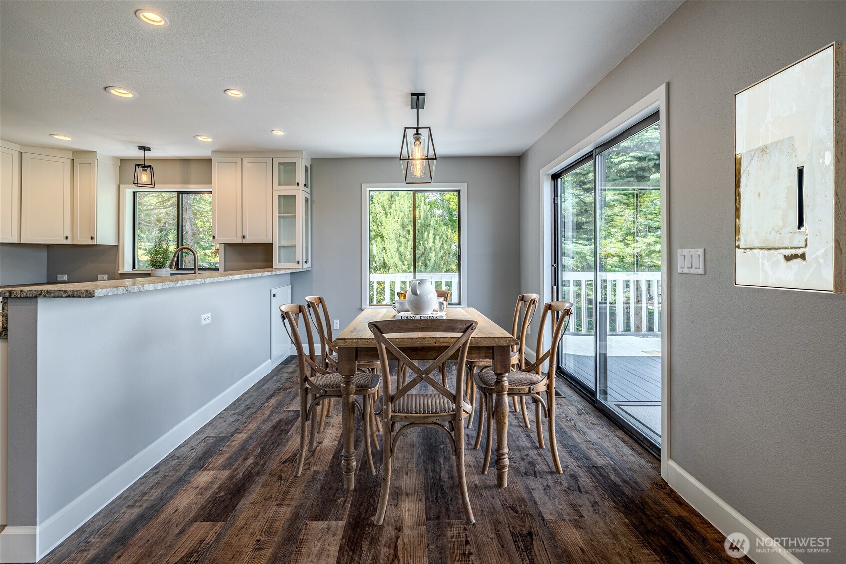 4124 Lakeview Place Chelan, WA 98816 - Photo 10 of 40 a dining room with furniture window wooden floor