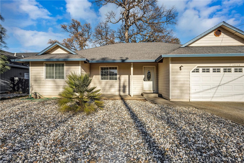 18230 Hidden Valley Road Hidden Valley Lake, CA 95467 - Photo 2 of 22 a front view of a house with garden
