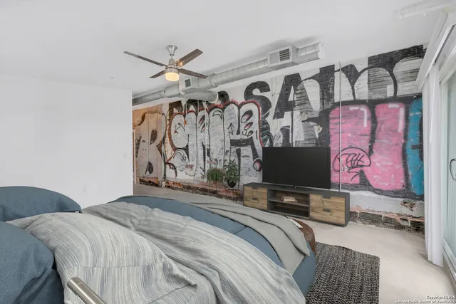 a bedroom with a bed and a walk in closet