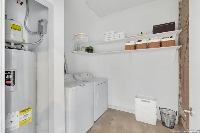 a utility room with dryer and washer