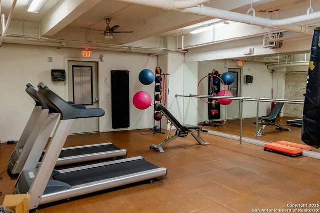 a view of a room with gym equipment