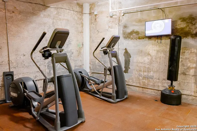 a view of a room with gym equipment