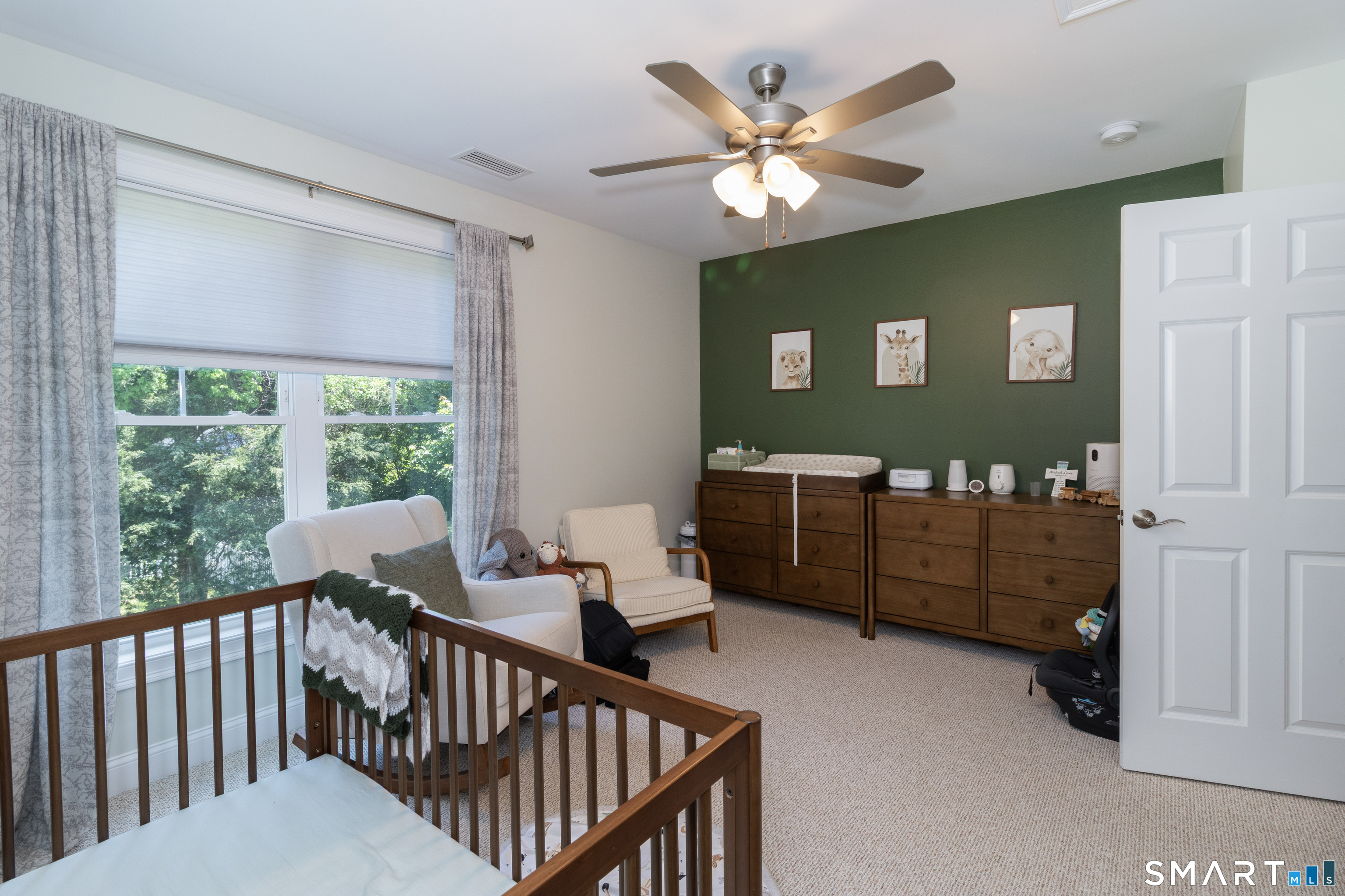 656 Bartholomew Road, Unit 656 Middletown, CT 06457 - Photo 19 of 27 a view of a livingroom with furniture and windows