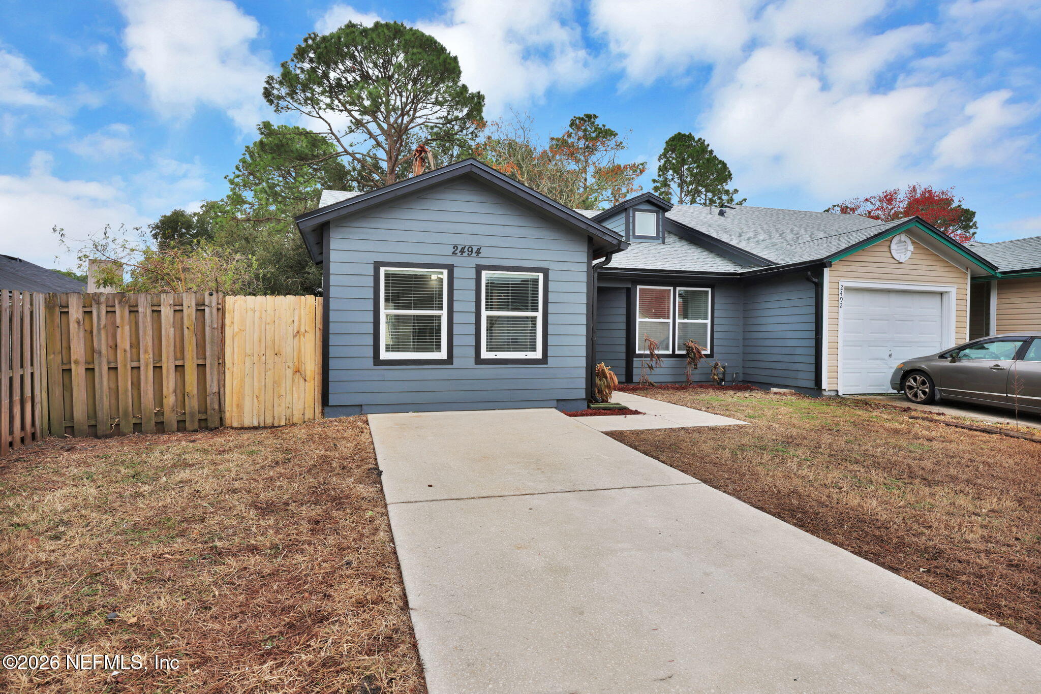2494 Spring Vale Road Jacksonville, FL 32246 - Photo 3 of 36 a house with a outdoor space