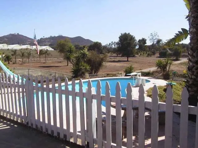 839 Cassou Road San Marcos, CA 92069 - Photo 1 of 1 a view of a wooden fence