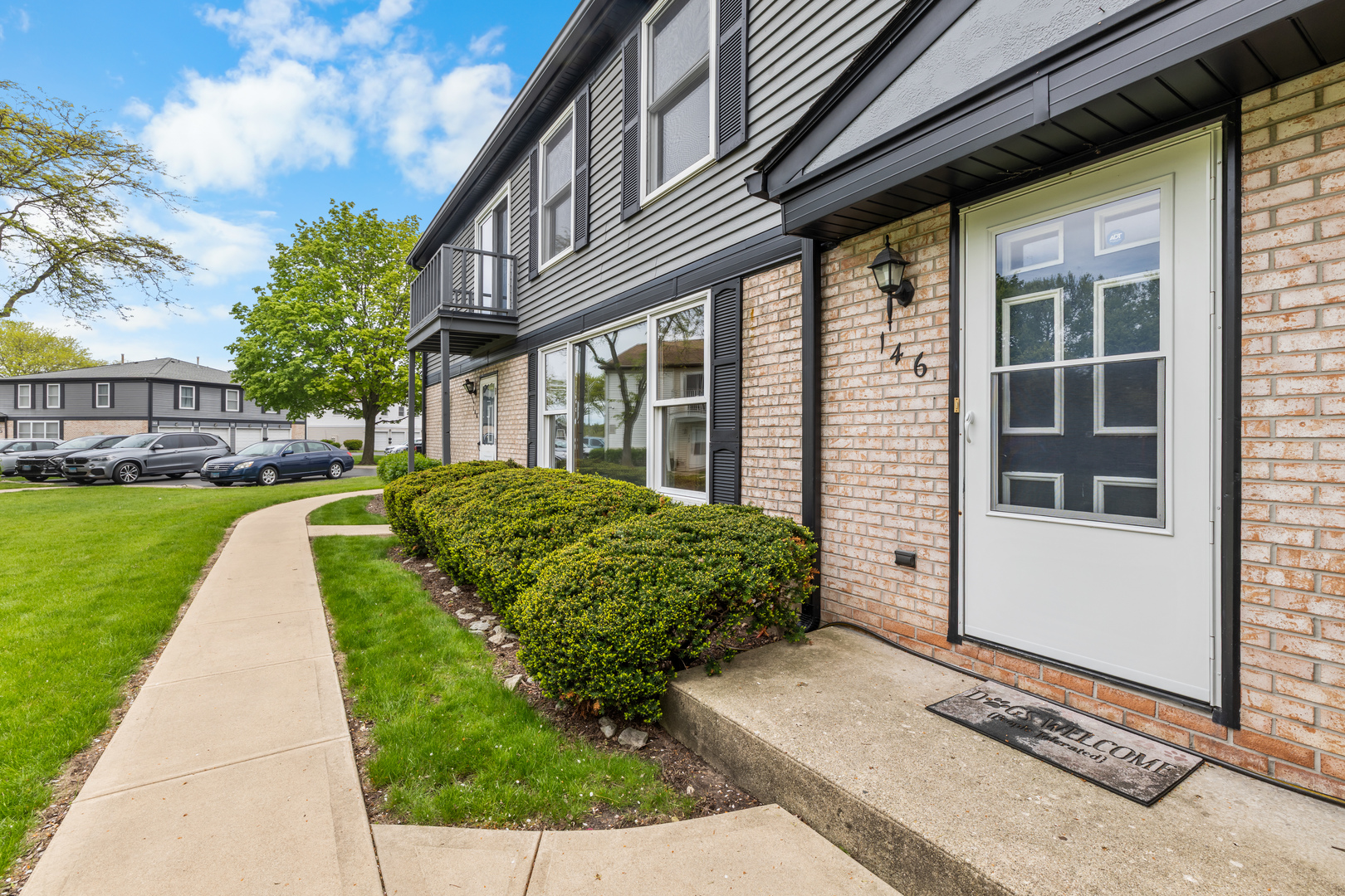 146 Inverrary Lane, Unit 146 Deerfield, IL 60015 - Photo 3 of 19 a view of a house with a garden
