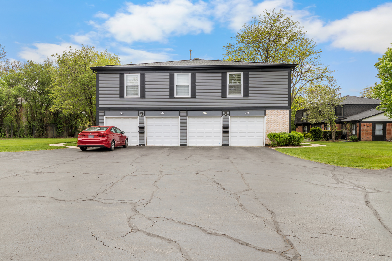 146 Inverrary Lane, Unit 146 Deerfield, IL 60015 - Photo 4 of 19 a front view of a house with a yard