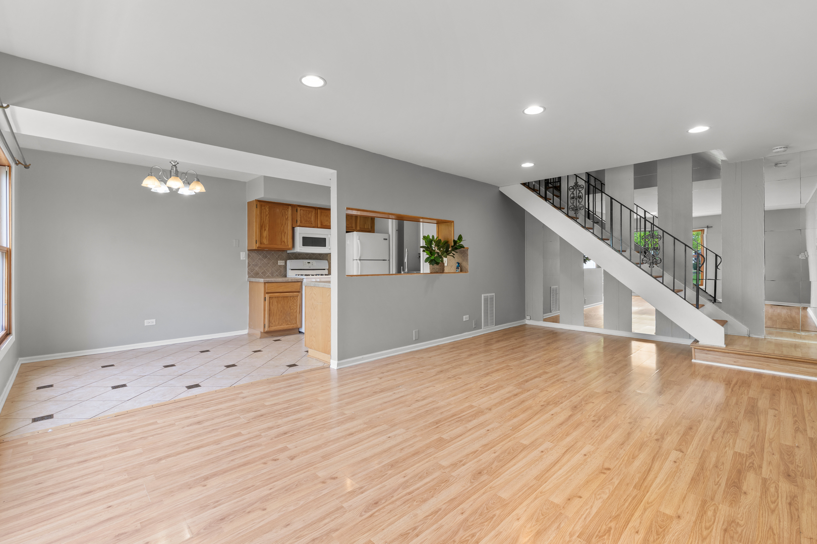 146 Inverrary Lane, Unit 146 Deerfield, IL 60015 - Photo 5 of 19 a view of empty room with wooden floor