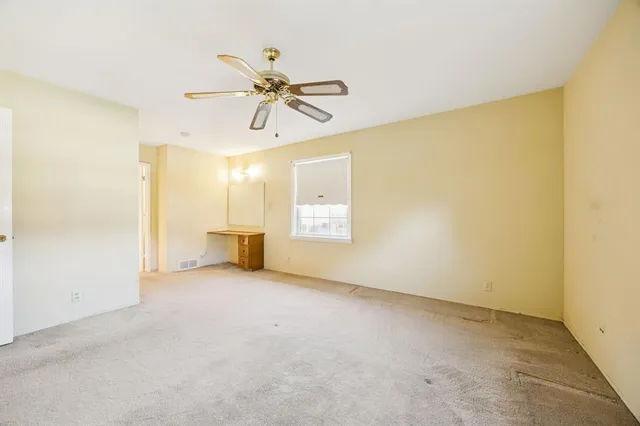a view of a livingroom with a window