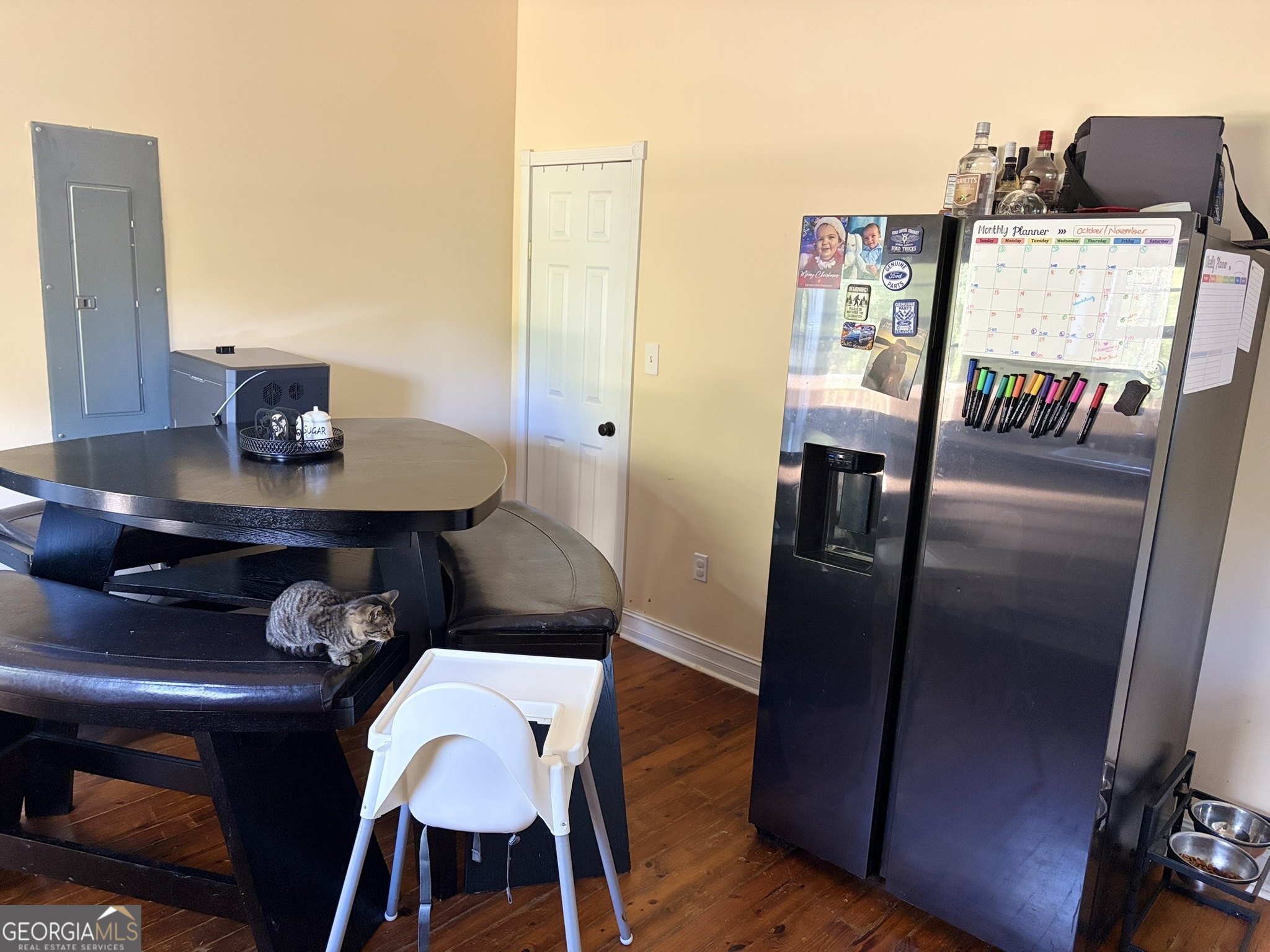 80 Baugh Street Commerce, GA 30529 - Photo 13 of 31 a view of a dining room with furniture and wooden floor