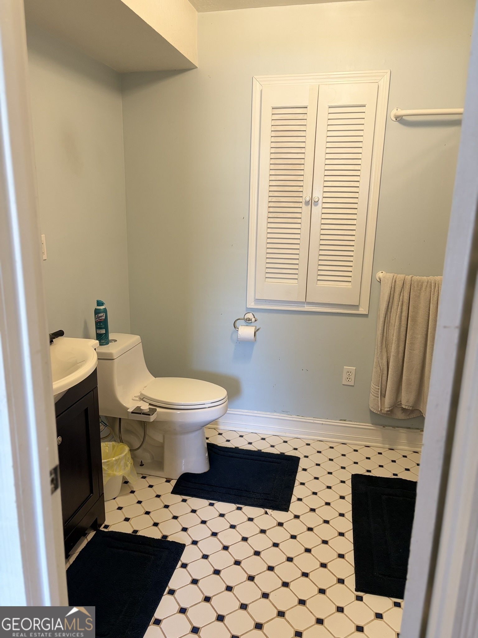 80 Baugh Street Commerce, GA 30529 - Photo 24 of 31 a bathroom with a sink toilet and window
