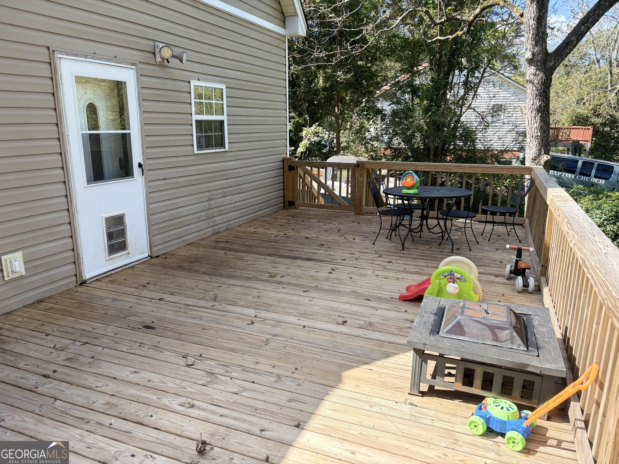 80 Baugh Street Commerce, GA 30529 - Photo 28 of 31 a view of house with deck outdoor seating space