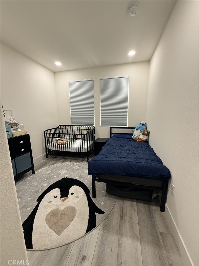 4067 Summer Corona, CA 92883 - Photo 4 of 12 Alternate view of secondary bedroom with recessed lighting and dual windows.