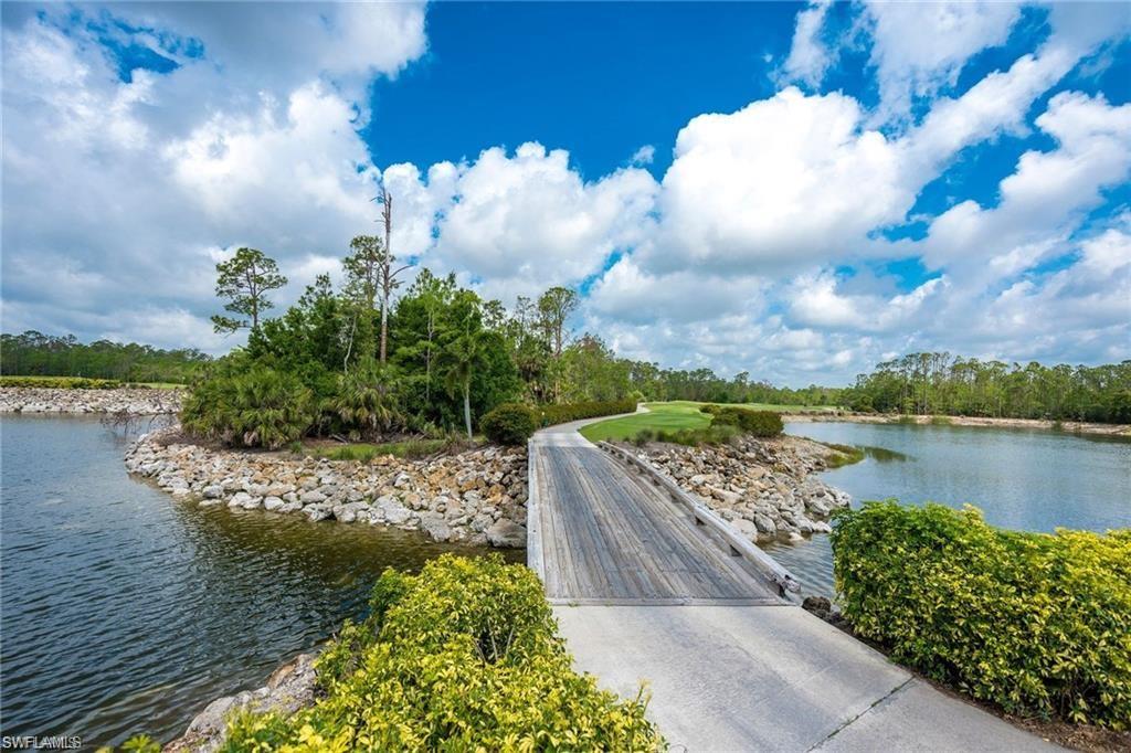 Undisclosed Address Naples, FL 34112 - Photo 20 of 28 a view of a lake with a big yard
