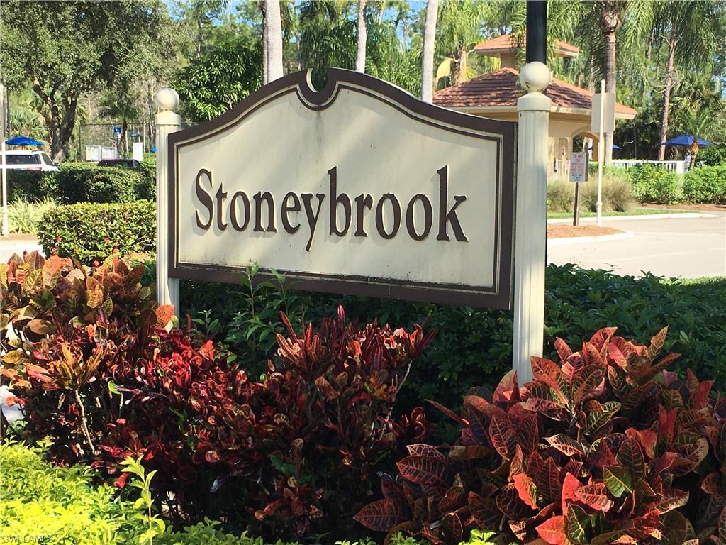 Undisclosed Address Naples, FL 34112 - Photo 2 of 28 a sign on the side of a street