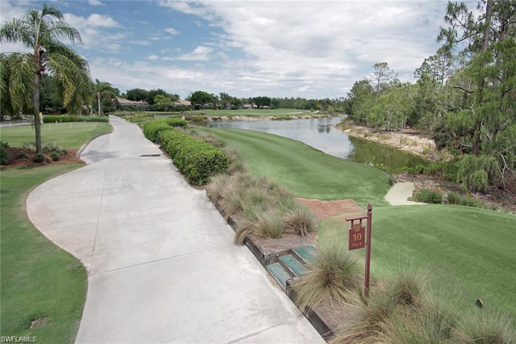 Undisclosed Address Naples, FL 34112 - Photo 25 of 28 a view of a garden with an outdoor space
