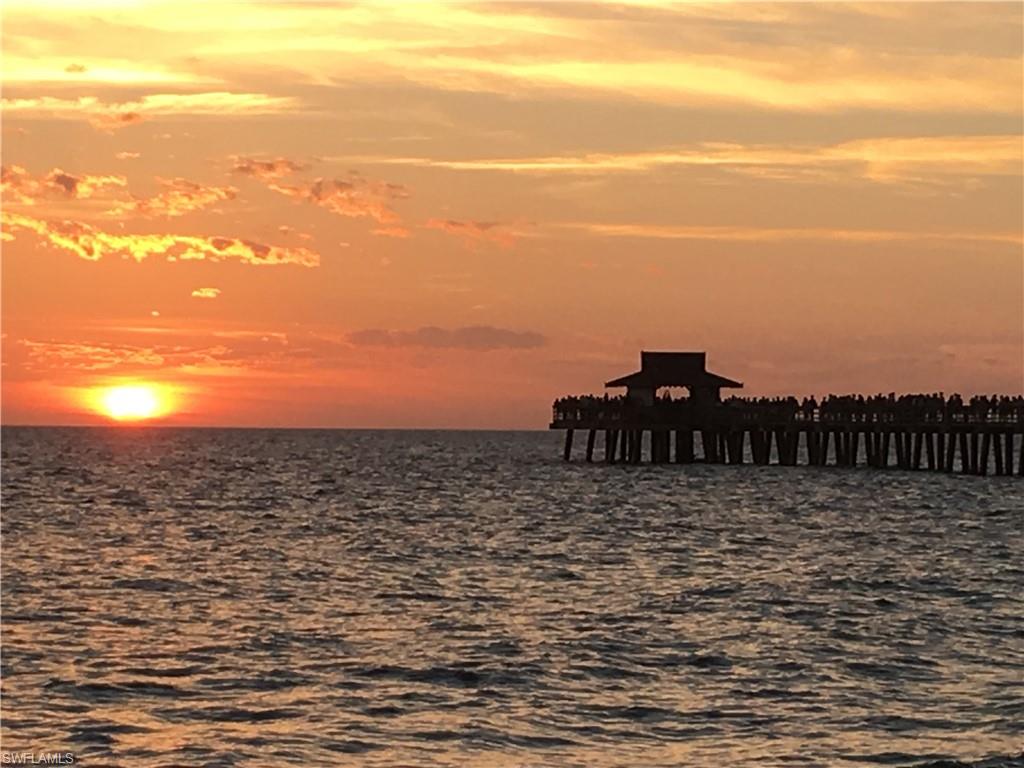 Undisclosed Address Naples, FL 34112 - Photo 26 of 28 a view of a ocean next to a beach
