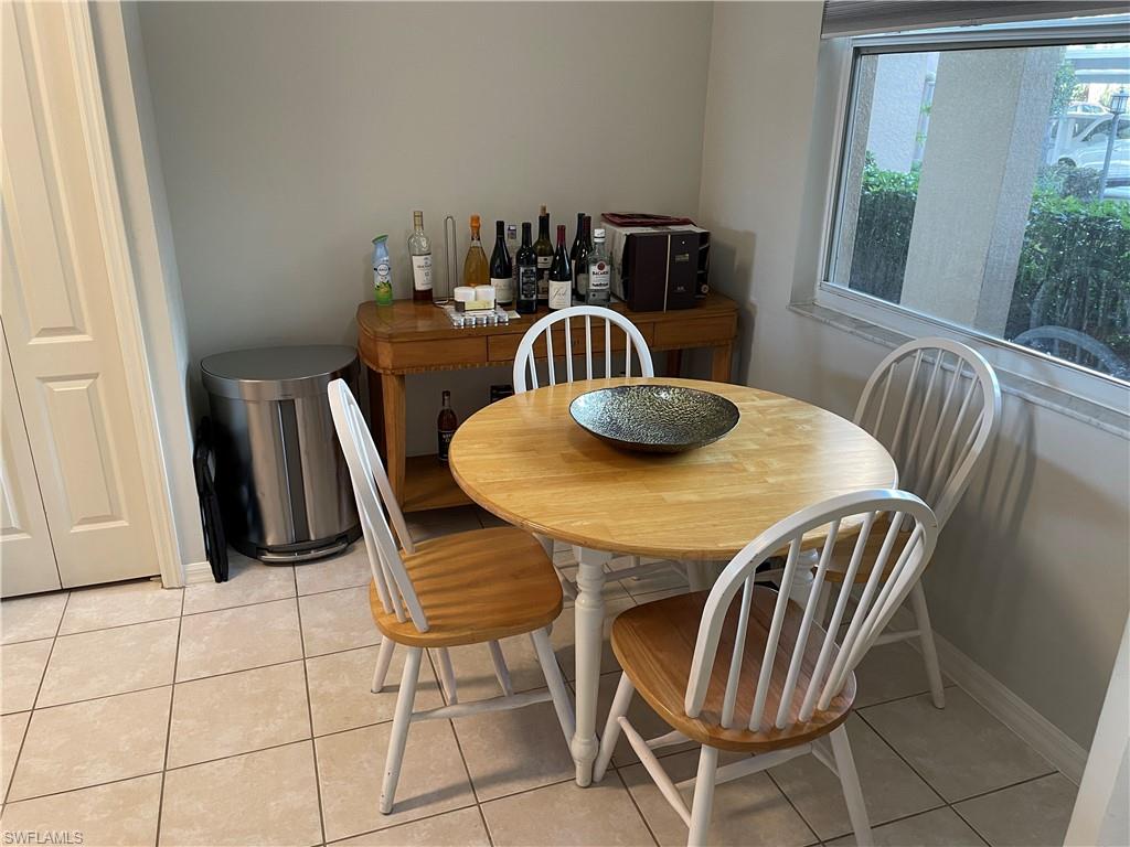 Undisclosed Address Naples, FL 34112 - Photo 8 of 28 a dining room with furniture and window